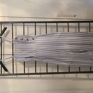 Stripe jumpsuit with gathered back straight leg button detail